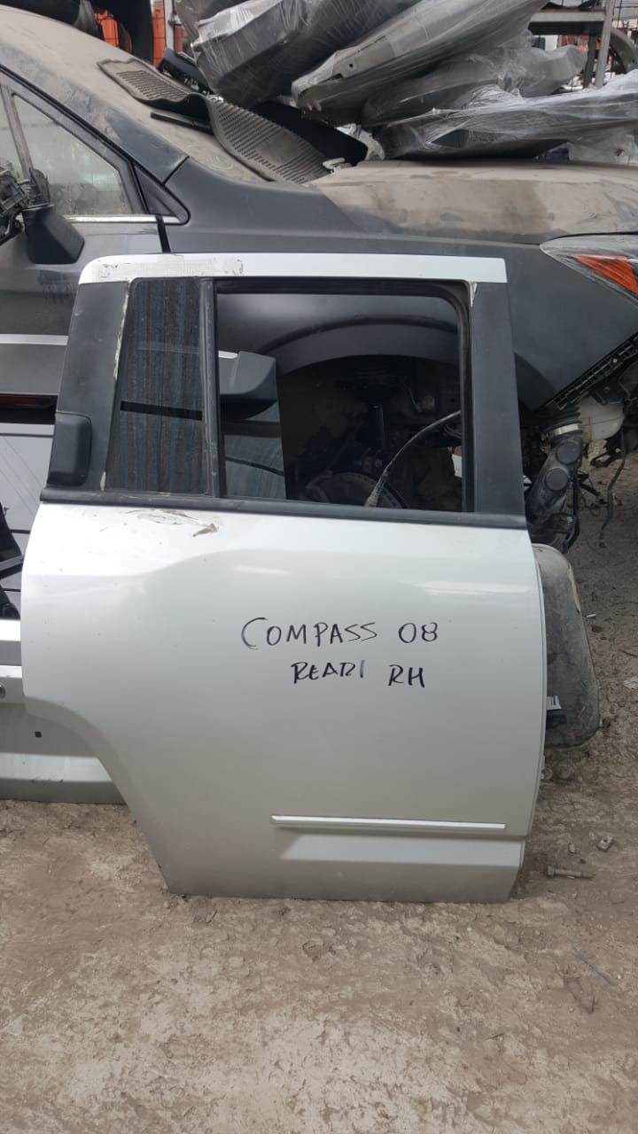 PUERTA POSTERIOR DERECHA JEEP COMPASS 2007 AL 2010