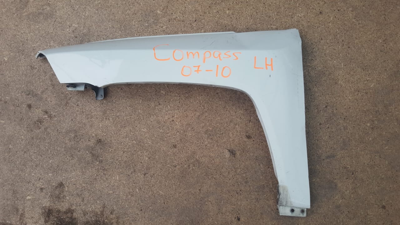 TAPABARROS  IZQUIERDO JEEP COMPASS 2007 AL 2010