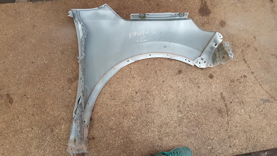 TAPABARROS IZQUIERDO FORD EXPLOR 2011 AL 2015