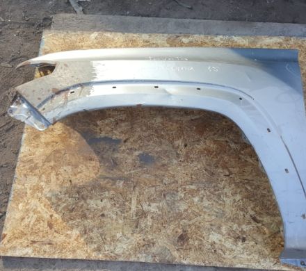 TAPABARRO IZQUIERDO GRIS TOYOTA TACOMA 2016 AL 2019