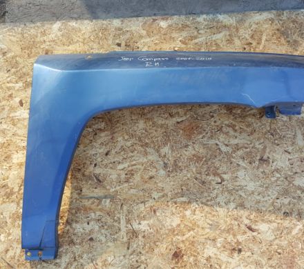 TAPABARROS DERECHO CELESTE JEEP COMPASS 2007 AL 2010