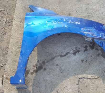 TAPABARROS DERECHO NISSAN SENTRA 2013 AL 2015 CON DETALLE